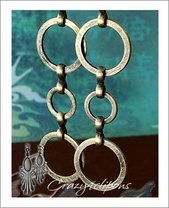 Brass Dancing Hoops Clip Earrings