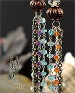 Calypso Dripping gems clip earrings
