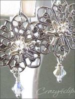 Silver Victorian rosette clip earrings