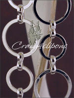 Dancing hoops long clip earrings