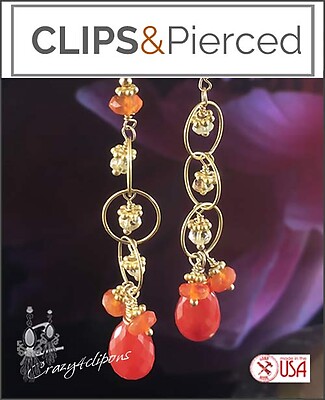 Playful Movement: Gold Dangling Clip On Earrings with Carnelian