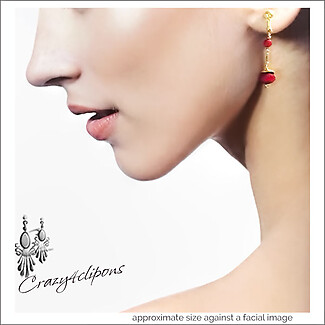 Elegant: Red Crystal Dangling Clip On Earrings in Gold Filled Design.
