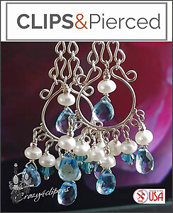 Sparkle and Shine: Gleaming Silver with Blue Topaz Dangle Magic.