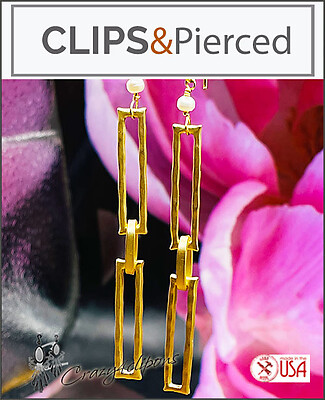 Timeless Elegance: Long Gold Dangling Clip Earrings